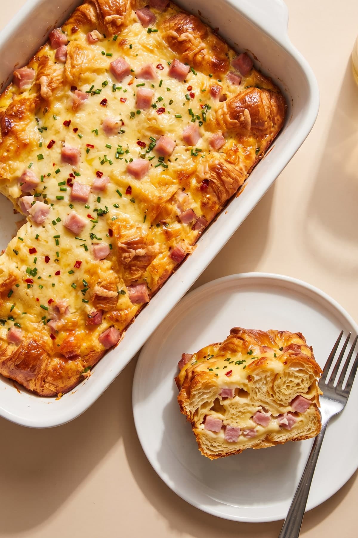 Croissant Breakfast Casserole With Ham and Gruyère ready to serve